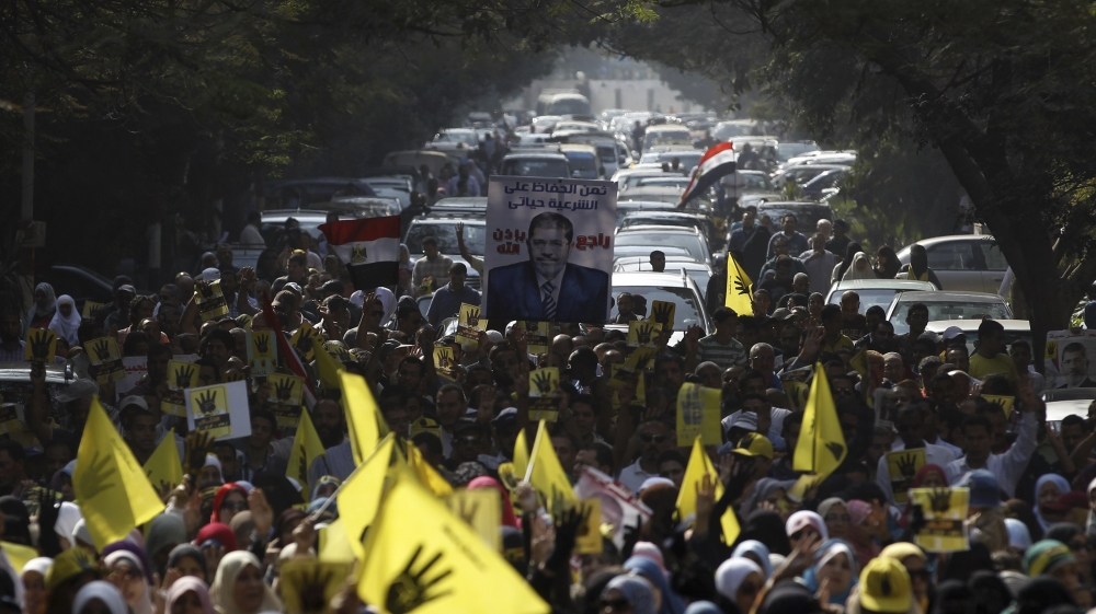 Supporters of ousted Egyptian President Mursi take part in a protest in Cairo
