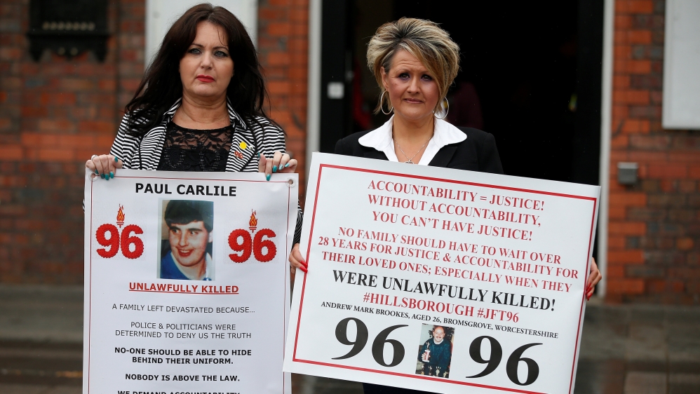 Louise Brooks and Donna Miller campaign for victims of the Hillsborough disaster in Warrington [Andy Yates/Reuters]