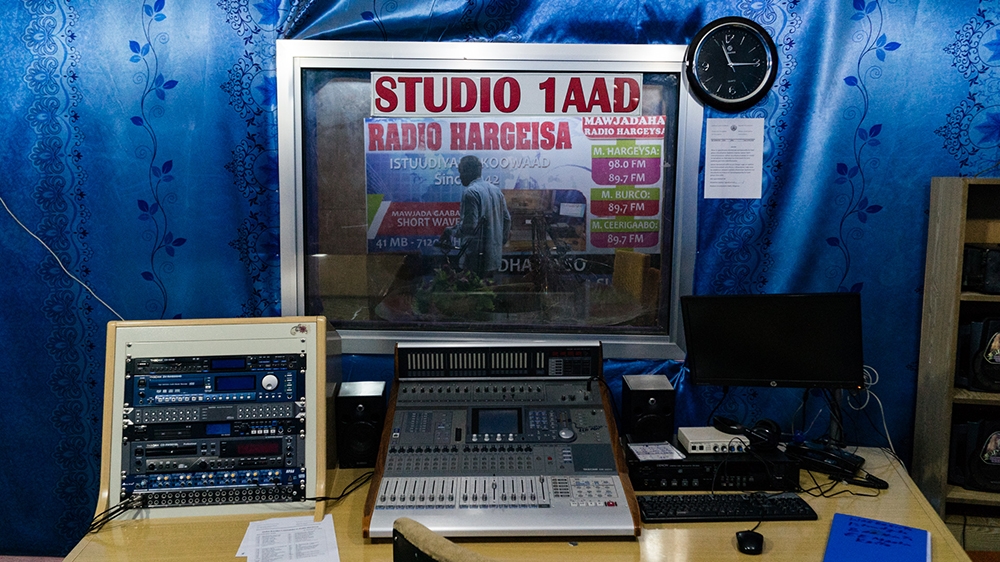 A radio operator prepares for a forthcoming broadcast at Radio Hargeisa [Janto Djassi/Picture Me Different]