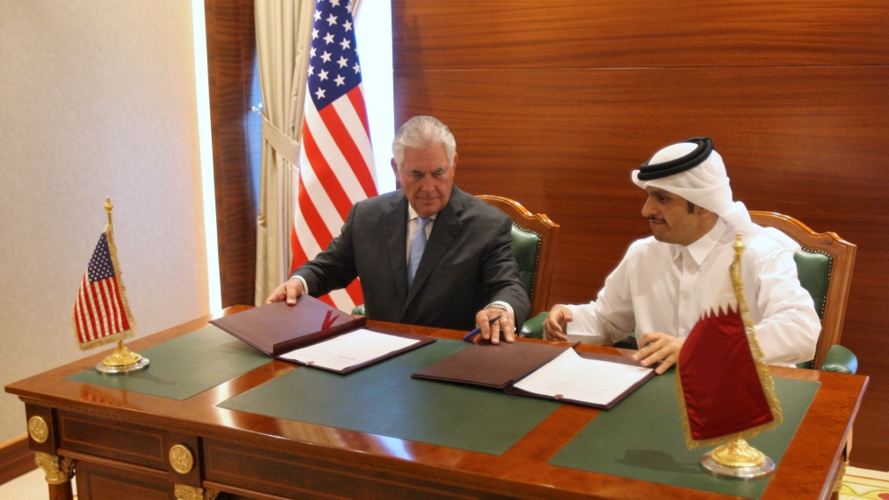 Qatar''s foreign minister Sheikh Mohammed bin Abdulrahman al-Thani and U.S. Secretary of State Rex Tillerson sign a memorandum of understanding in Doha