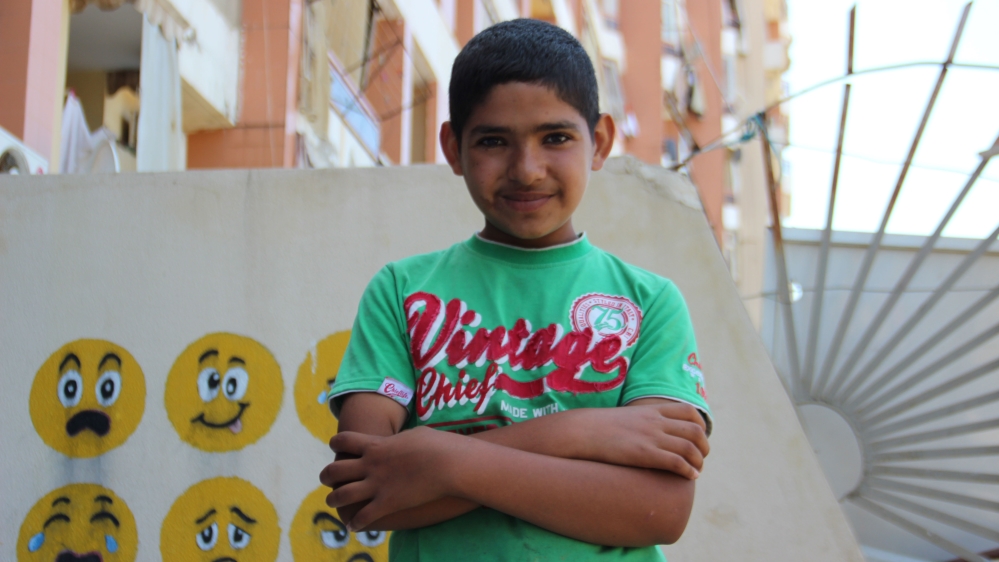 'I am sad because I cannot go to school,' Saddam says [Katarina Stano/Al Jazeera]