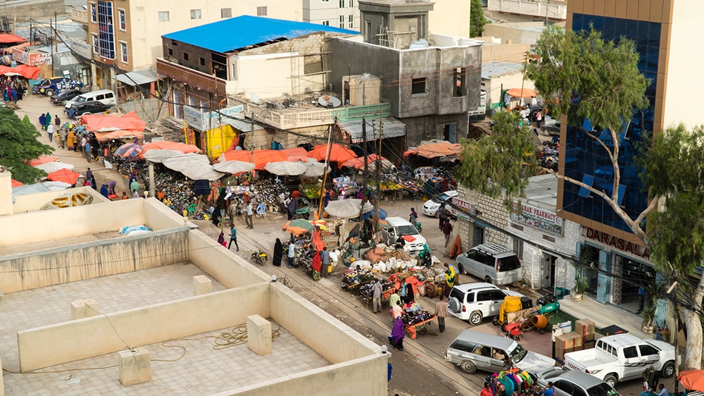 
Maize, sorghum flour, and other grains have been sold here since the colonial era [Janto Djassi/Picture Me Different] 
