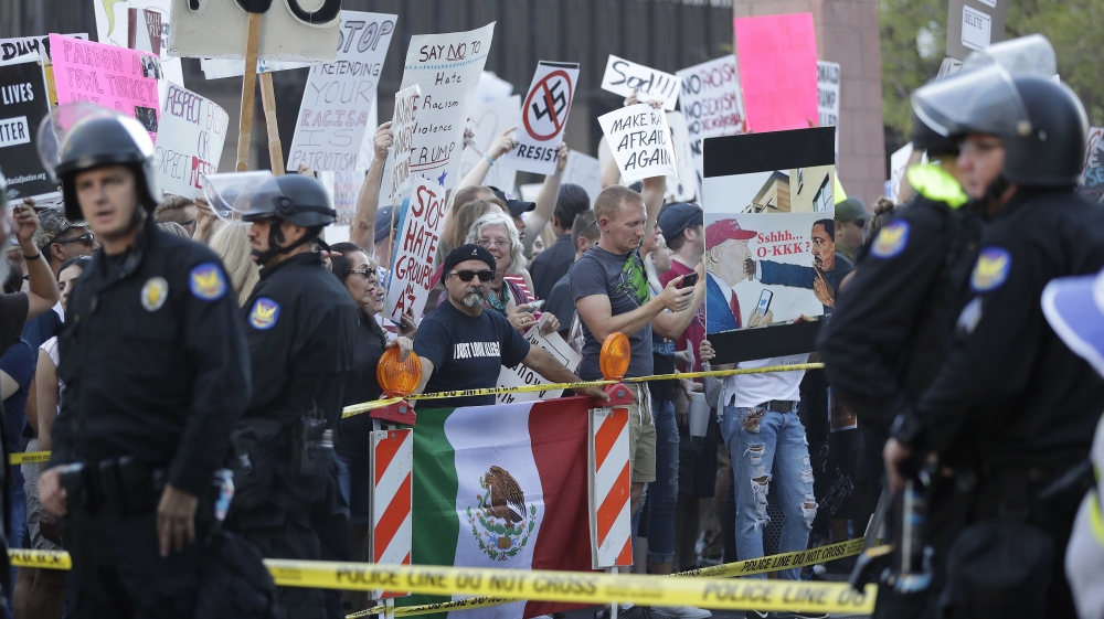 Authorities in Phoenix were on high alert in the aftermath of events in Charlottesville [Matt York/AP]