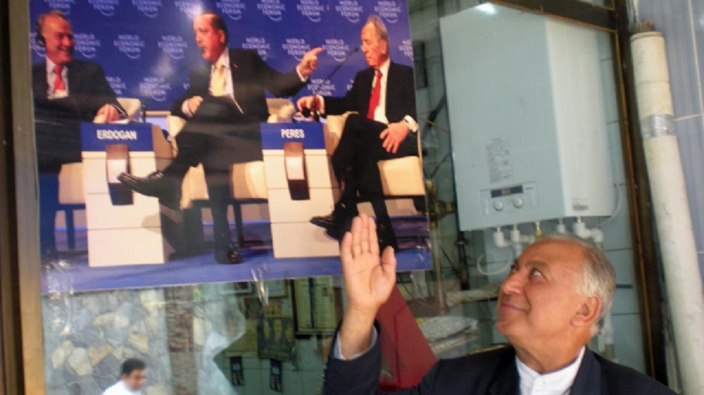 Erdogan's 'one minute' moment filled many Turks, such as cafe owner Hoca Yasar, with pride [Ayse Alibeyoglu/Al Jazeera]