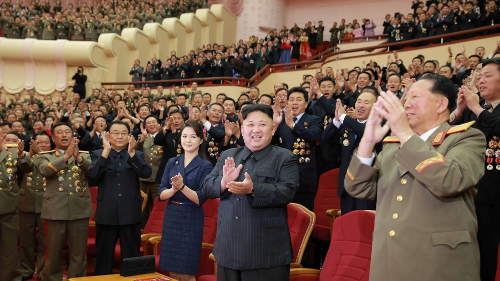 Kim Jong-un claps during a celebration for nuclear scientists and engineers who contributed to a hydrogen bomb test, in this undated photo released by North Korea''s Korean Central News Agency (KCNA)