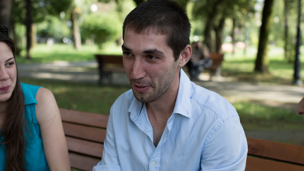 Omar Shakouj with friends in Sukhumi [Alice Aedy/Al Jazeera]