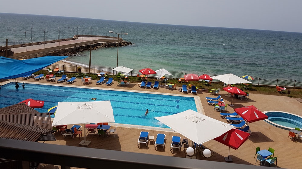 A ticket to a swimming pool costs about $5 - a luxury that many cannot afford in Gaza, where poverty levels are close to 60 percent [Ahmed Abdelal/  Al Jazeera]