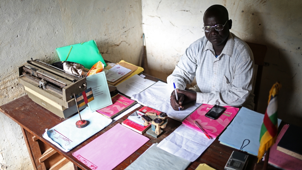Mohammad Saboun, 'company commander' for the FPRC in Ndele, sits in his office in the occupied police station. He oversees the FPRC's police and gendarmes, calling Ndele a model [Cassandra Vinograd/Al Jazeera]