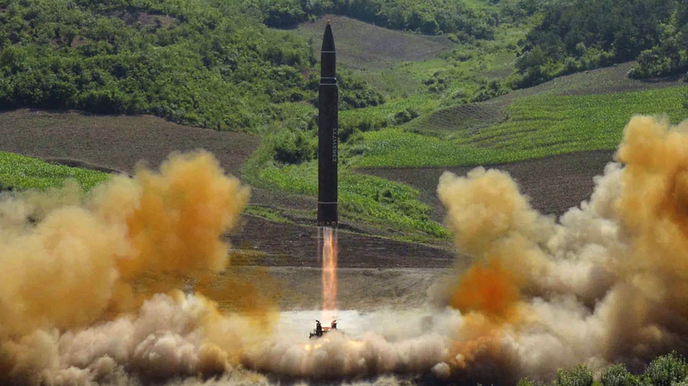 This file photo distributed by the North Korean government shows what was said to be the launch of a Hwasong-14 intercontinental ballistic missile, ICBM, in North Korea's northwest, Tuesday, July 4,
