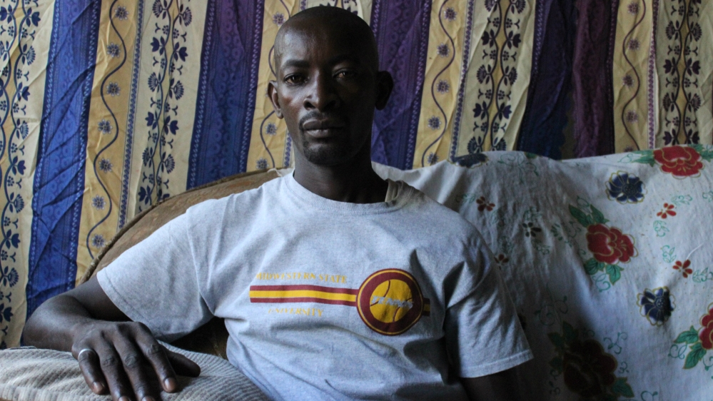 Since his wife's murder, Noah Musiba has had to support their young daughter alone [Megan Iacobini de Fazio/Al Jazeera]