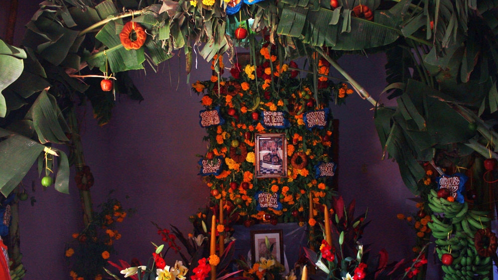 Mariano Lopez and Isabel Jimenez built a biguie' for Jimenez's mother who passed away this year [Simon Schatzberg/Al Jazeera]