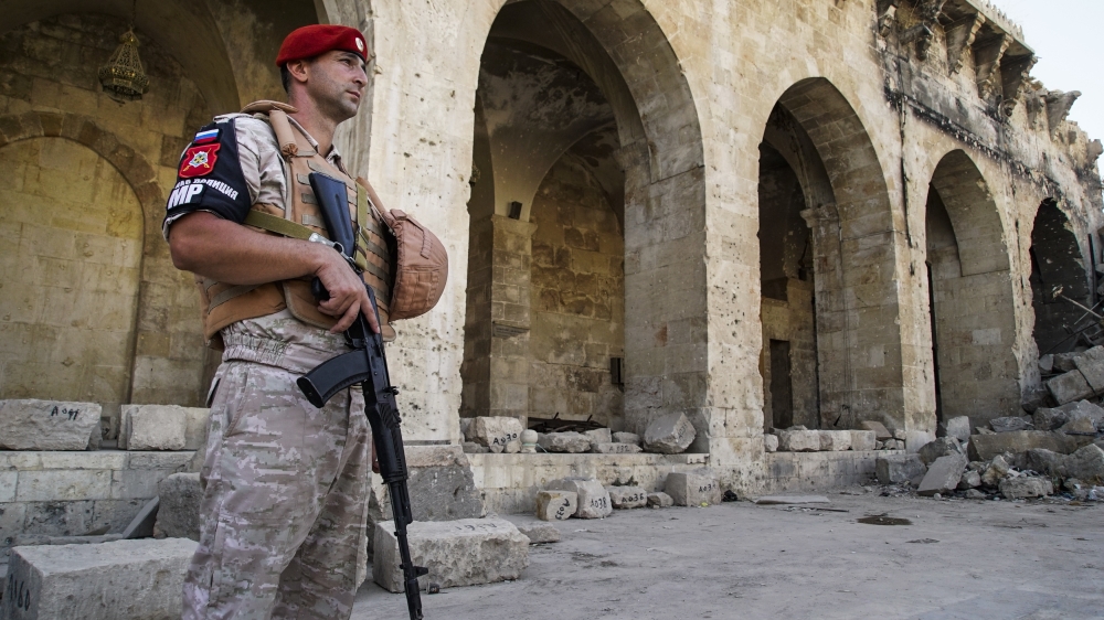 Military checkpoints are spread throughout the eastern neighbourhoods [Max Black/AP]