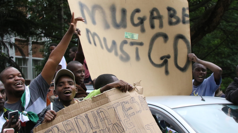 Protesters calling for Zimbabwean President Robert Mugabe to step down take to the streets in Harare