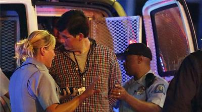 At least 10 journalists have been arrested during the month and a half protests in St Louis [Jeff Robinson/AP Photo]