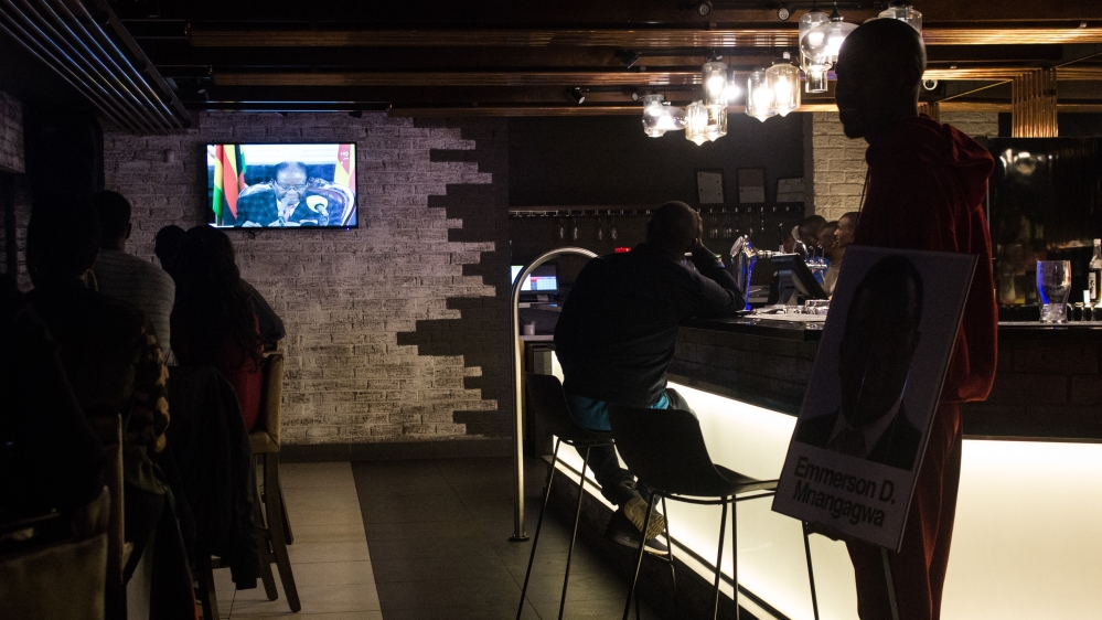 
Those who had gathered in bars and restaurants expressed disappointment and anxiety after Mugabe failed to quit [Tendai Marima/Al Jazeera]
