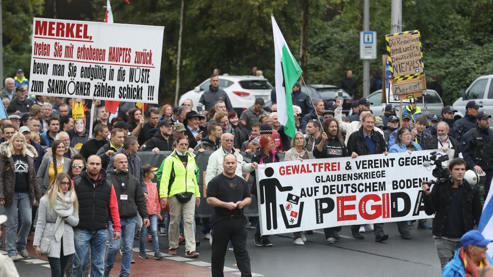 Pegida supporters regularly hold anti-Islam protests in east Germany, a region home to anti-immigrant sentiment [File: Sean Gallup/Getty Images]