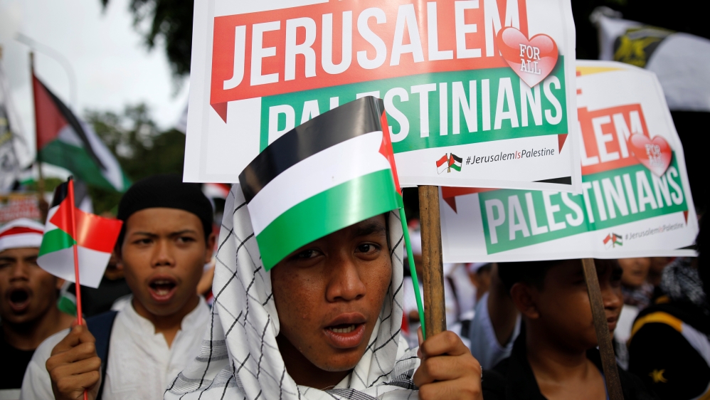 Protesters hold a rally outside the U.S. embassy in Jakarta, Indonesia, to condemn the U.S. decision to recognise Jerusalem as Israel''s capital