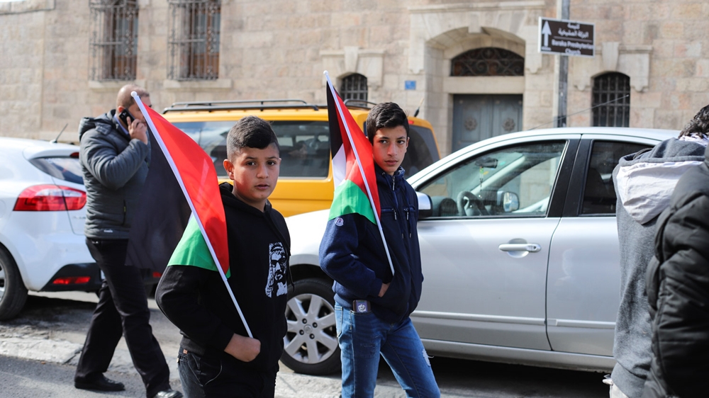 Palestinian men, women and children marched in Bethlehem [Jaclynn Ashly/Al Jazeera]