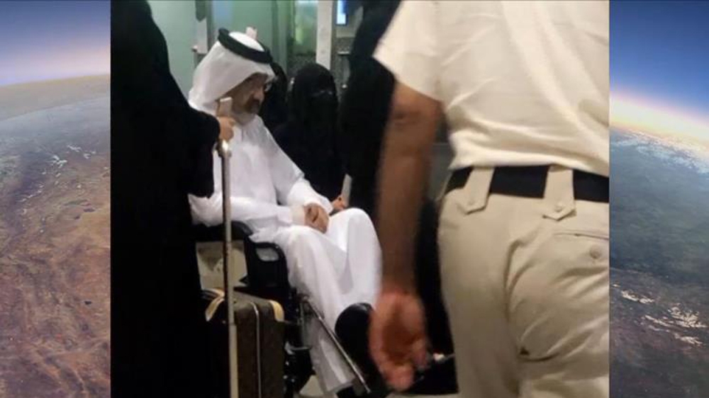Sheikh Abdullah on a wheel chair