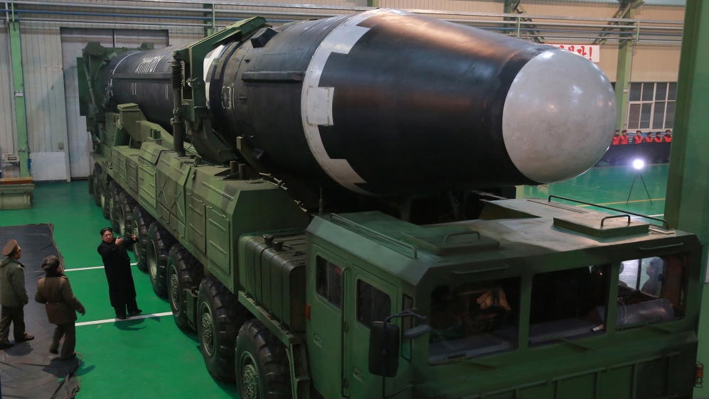 North Korea''s leader Kim Jong Un is seen as the newly developed intercontinental ballistic rocket Hwasong-15''s test was successfully launche