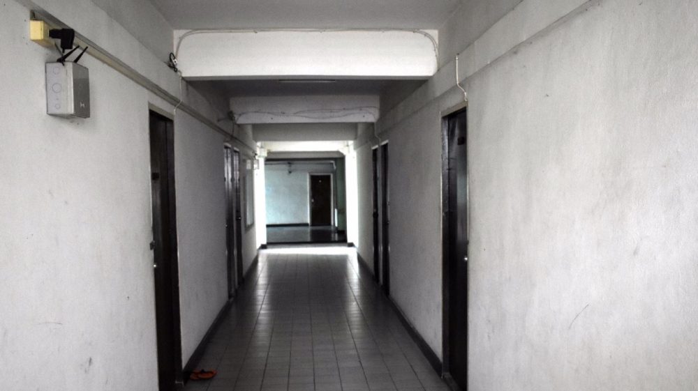 This apartment block on the city’s outskirts is home to roughly 30 Somali refugees living five to a room [Alastair G M/Al Jazeera]