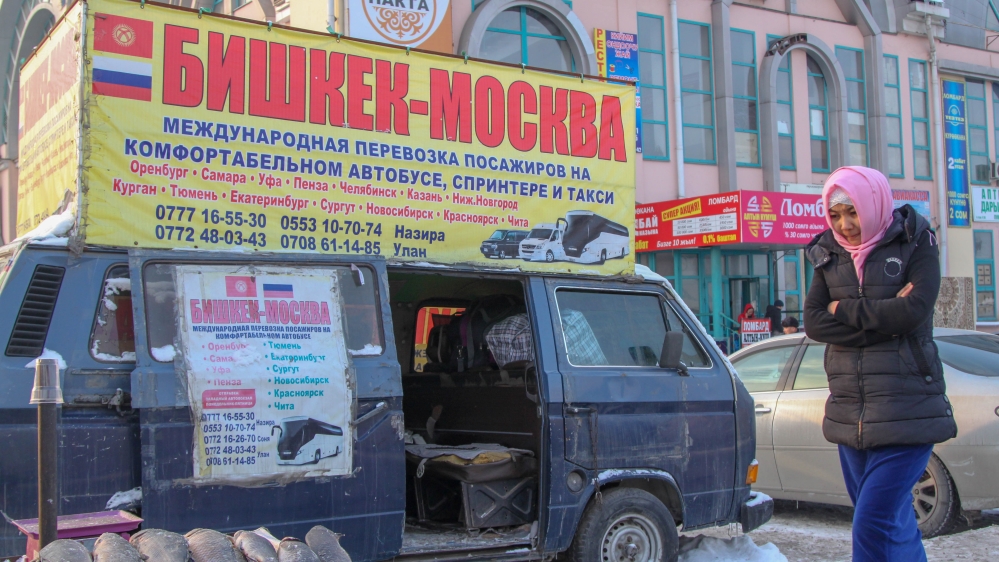 There are regular buses from Bishkek to Moscow at the local station as the majority of labour migrants choose Russia as the country of their destination [Nikolay Korzhov/Al Jazeera]