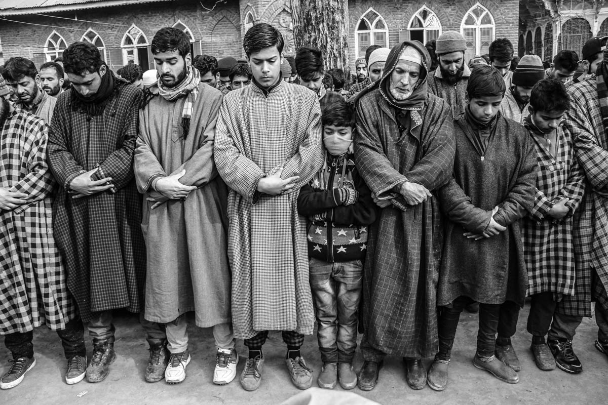 Children attending funeral prayers of a militant in Aripal Tral in Pulwam district, south of Srinagar city, the summer capital of Indian-controlled Kashmir.