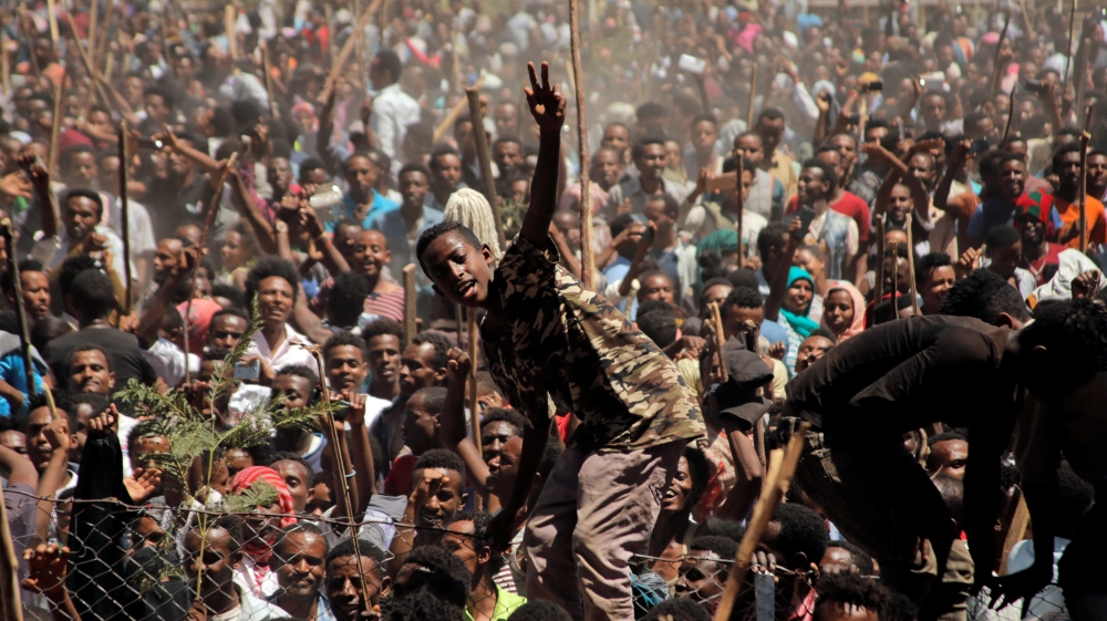 Supporters of Bekele Gerba, secretary general of the Oromo Federalist Congress (OFC), chant slogans to celebrate Gerba''s release from prison, in Adama, Oromia Region, Ethiopia