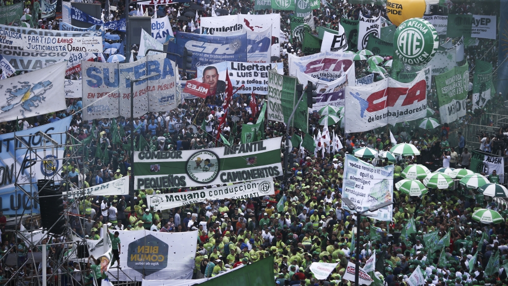 Thousands of people participate in a march through the Avenida 9 de Julio in Buenos Aires, Argentina [David Fernandez/EFE/EPA]
