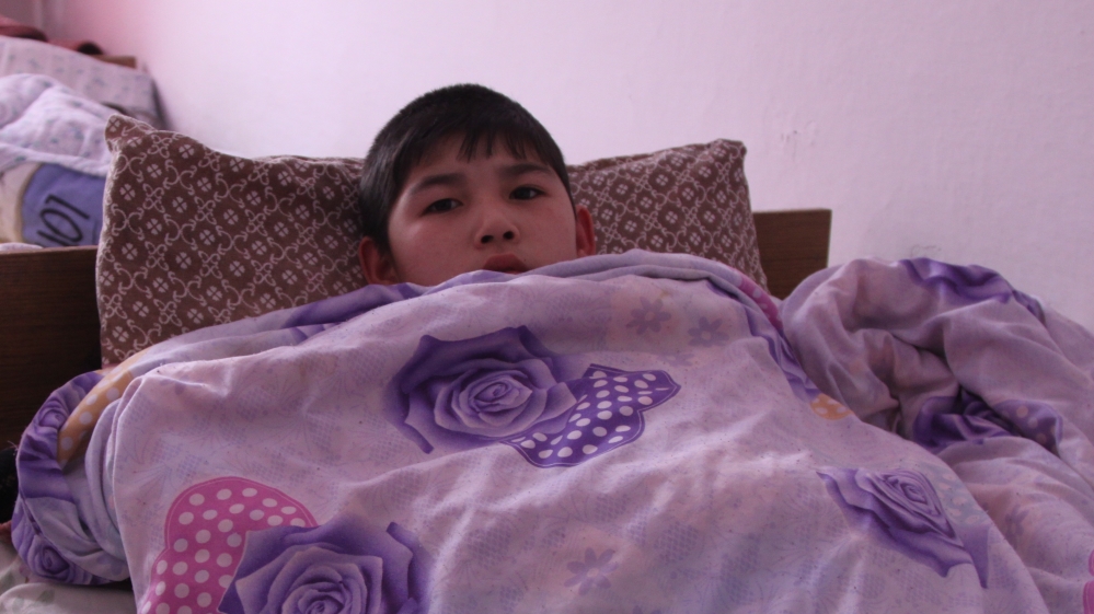 

Feruza Kenzhetaeva was left at an orphanage for children with disabilities as her parents cannot adequately look after her [Nikolay Korzhov/Al Jazeera]

Feruza Kenzhetaeva was left at an orphanage for children with disabilities as her parents cannot adequately look after her [Nikolay Korzhov/Al Jazeera]