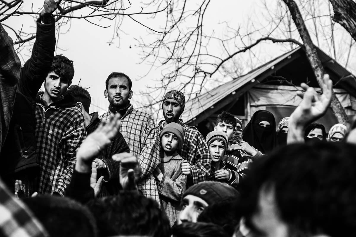 Children chanting anti-India slogans in Aripal Tral of Pulwama district, 43 km south of Srinagar city, the summer capital of Indian-controlled Kashmir, during a funeral of militant.