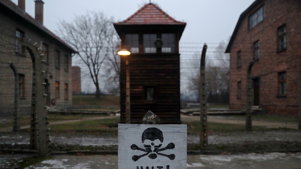 A sign reading "Stop!" in German and Polish is seen at the former Nazi German concentration and extermination camp Auschwitz in Oswiecim, Poland.