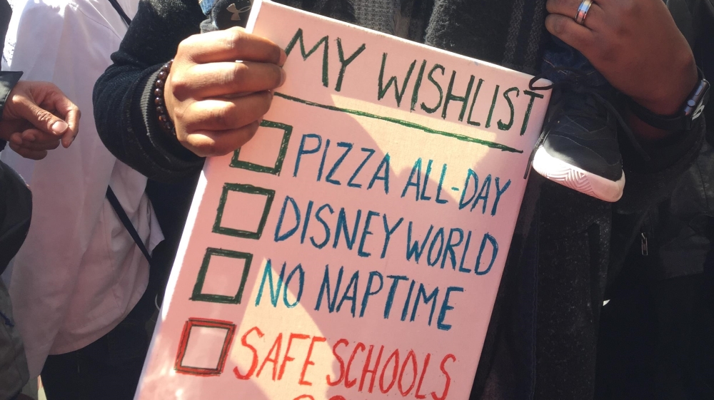 Almost everyone at the rally had a story about gun violence [Anar Virji/Al Jazeera]