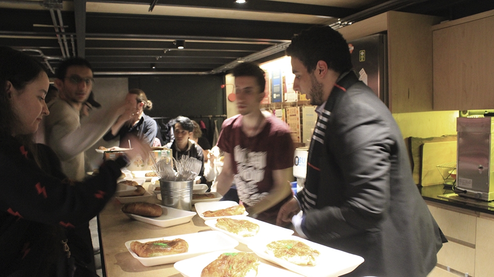 A selection of Syrian sweets are served at a comedy event in Istanbul, where several refugees are trying their hand at stand-up [Kristina Jovanovski/Al Jazeera]