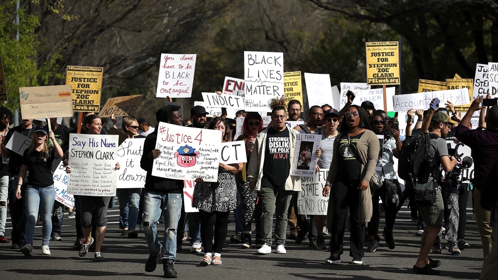 Police who shot Clark 20 times mistook a mobile phone he was holding for a firearm [Getty Images/AFP]