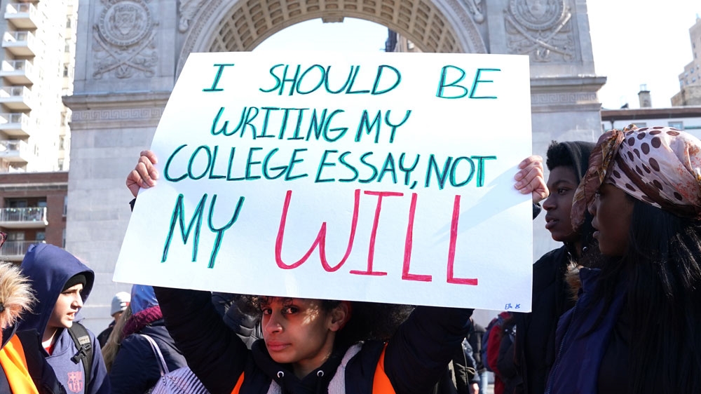 Students in New York take part in a national walkout to protest gun violence [Timothy A Clary/AFP] 
