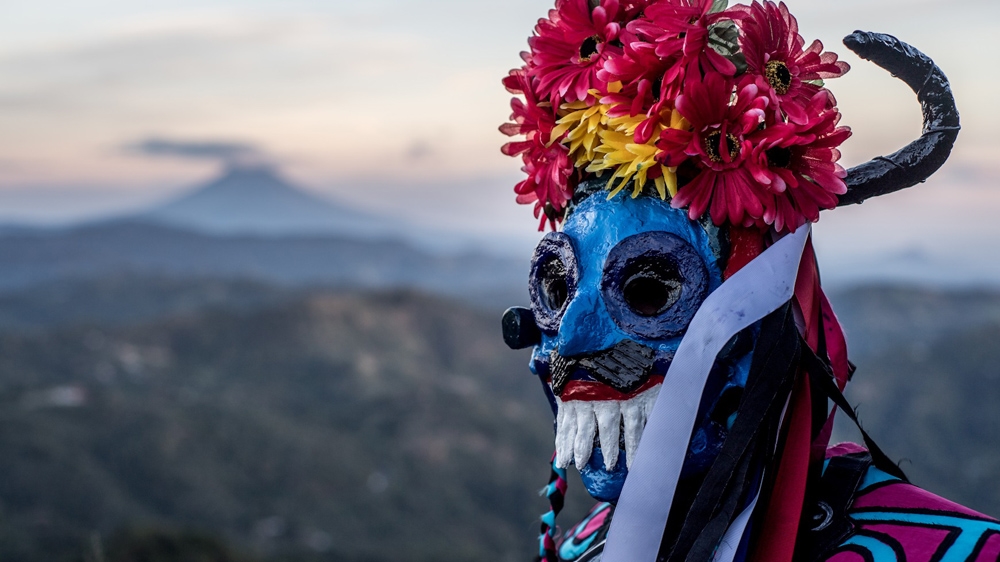 Friends of Juan Martin take part in traditional ceremonies to keep the culture of El Salvador alive. [Al Jazeera]