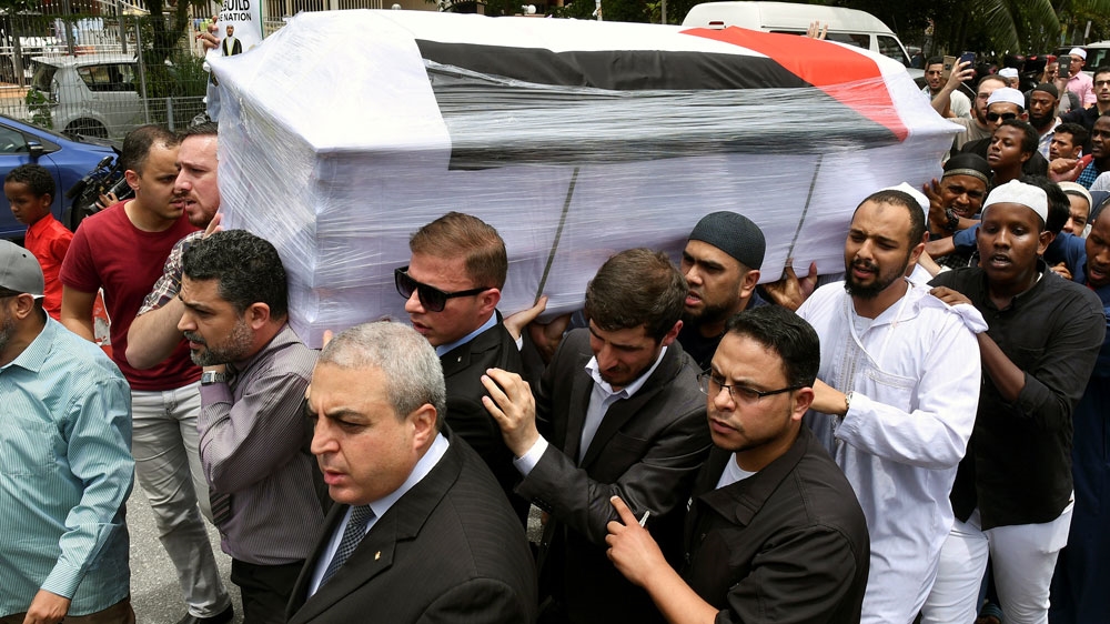 People carried the coffin of Fadi al-Batsh to a mosque for a special prayer in Kuala Lumpur [Reuters]
