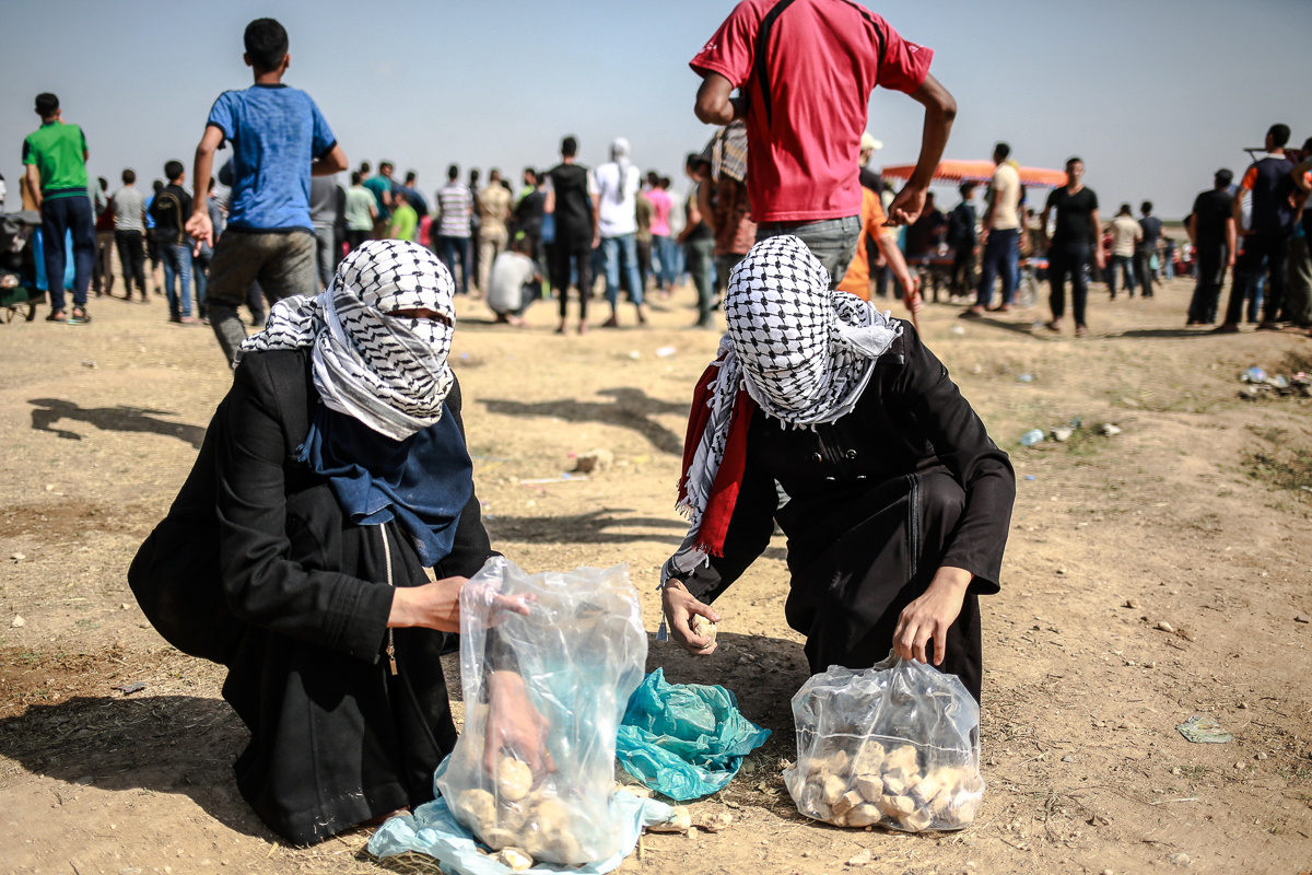 Palestinian women at protest [Hosam Salem/Al Jazeera]