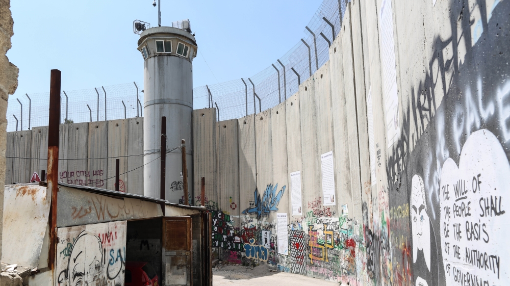 Apartheid in Paletine [Showkat Shafi/Al Jazeera]