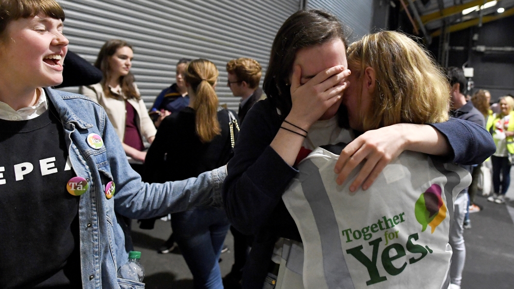 Activists react at the count centre as votes are tallied folowing yesterday''s referendum on liberalizing abortion law, in Dublin