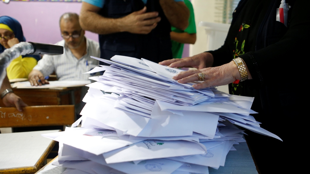 Lebanese election officials count ballots after the polling station closed during Lebanon''s parliamentary election, in Beirut