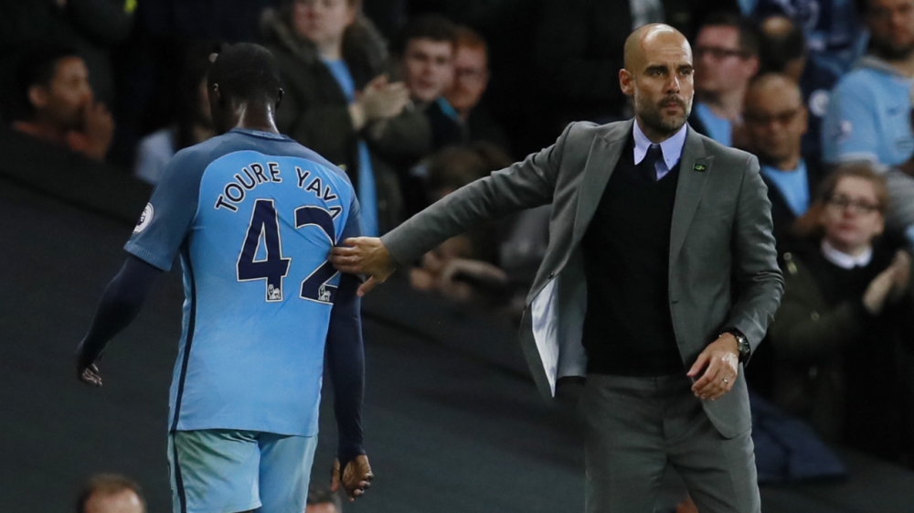 Yaya Toure and Pep Guardiola