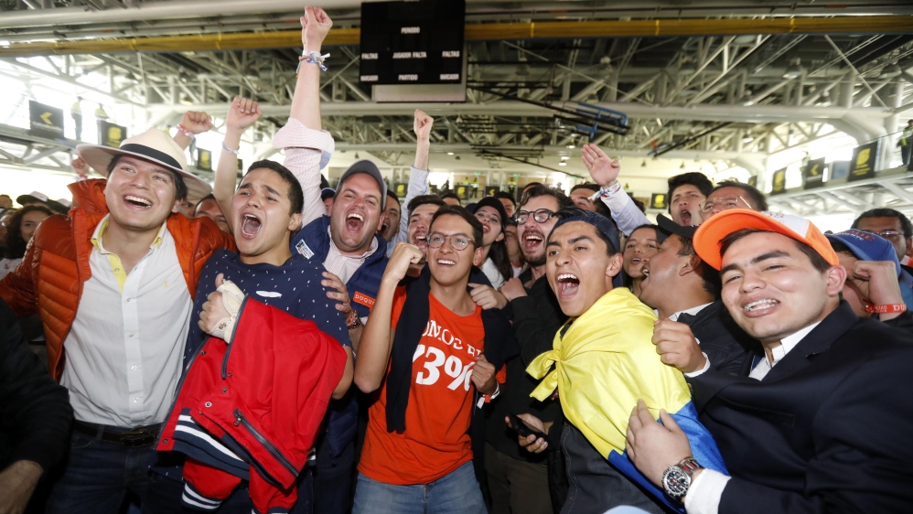 Supporters of Duque celebrate in the Colombian capital [Andres Stapff/Reuters]