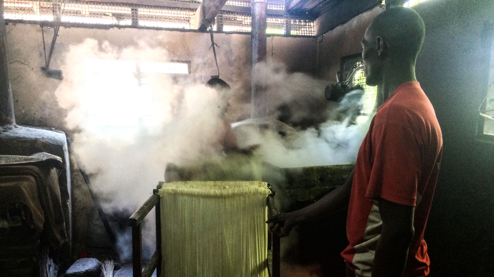  It is vital for the noodles to boil and steam under a burlap cover [Amanda Leigh Lichtenstein/Al Jazeera]