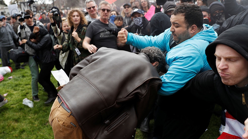 Some 300 people, including supporters of Trump and counterdemonstrators, descended on Berkeley on March 4, 2017 [File: Stephen Lam/Reuters]