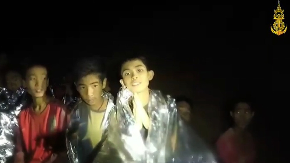 Video footage released on Wednesday showed the boys in good spirits [Royal Thai Navy/EPA-EFE]