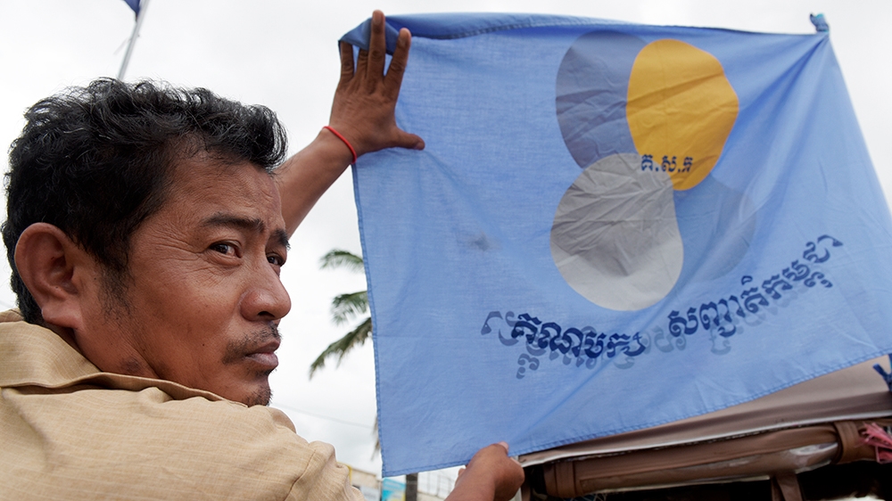 Cambodia goes to the polls on July 29 in an election devoid of a serious opposition after they were disbanded by a court and barred from running [Tang Chhin Sothy/AFP]