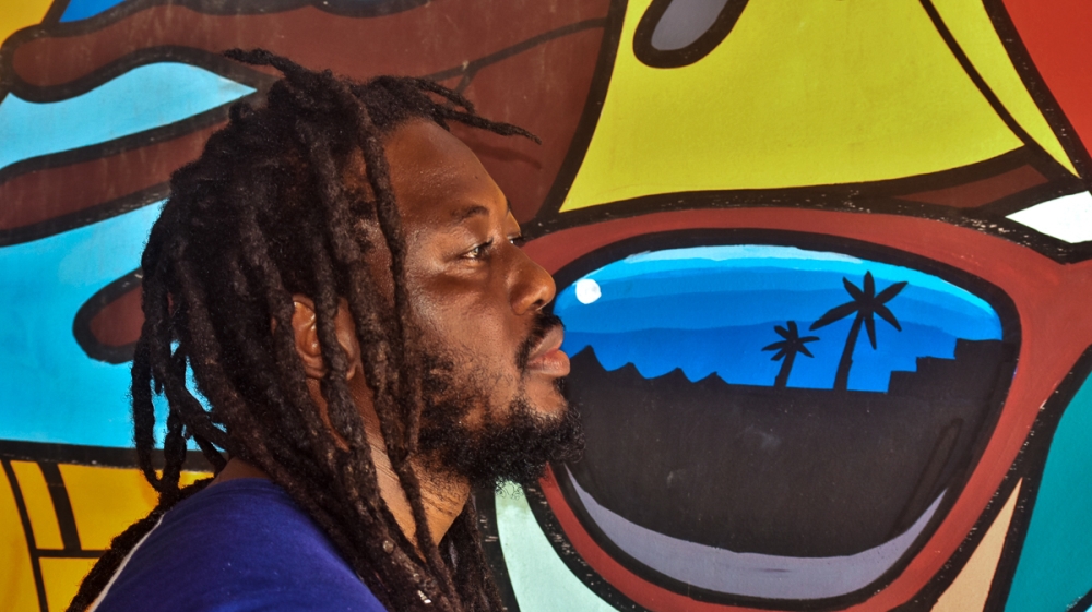 Malian born artist Jah Moko left a successful career as a music producer in France to create the Jah Moko Family music project in Senegal [Fragkiska Megaloudi/Al Jazeera]