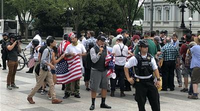 Around two dozen people showed up for the Unite the Right event [Tom Szypulski/Al Jazeera]